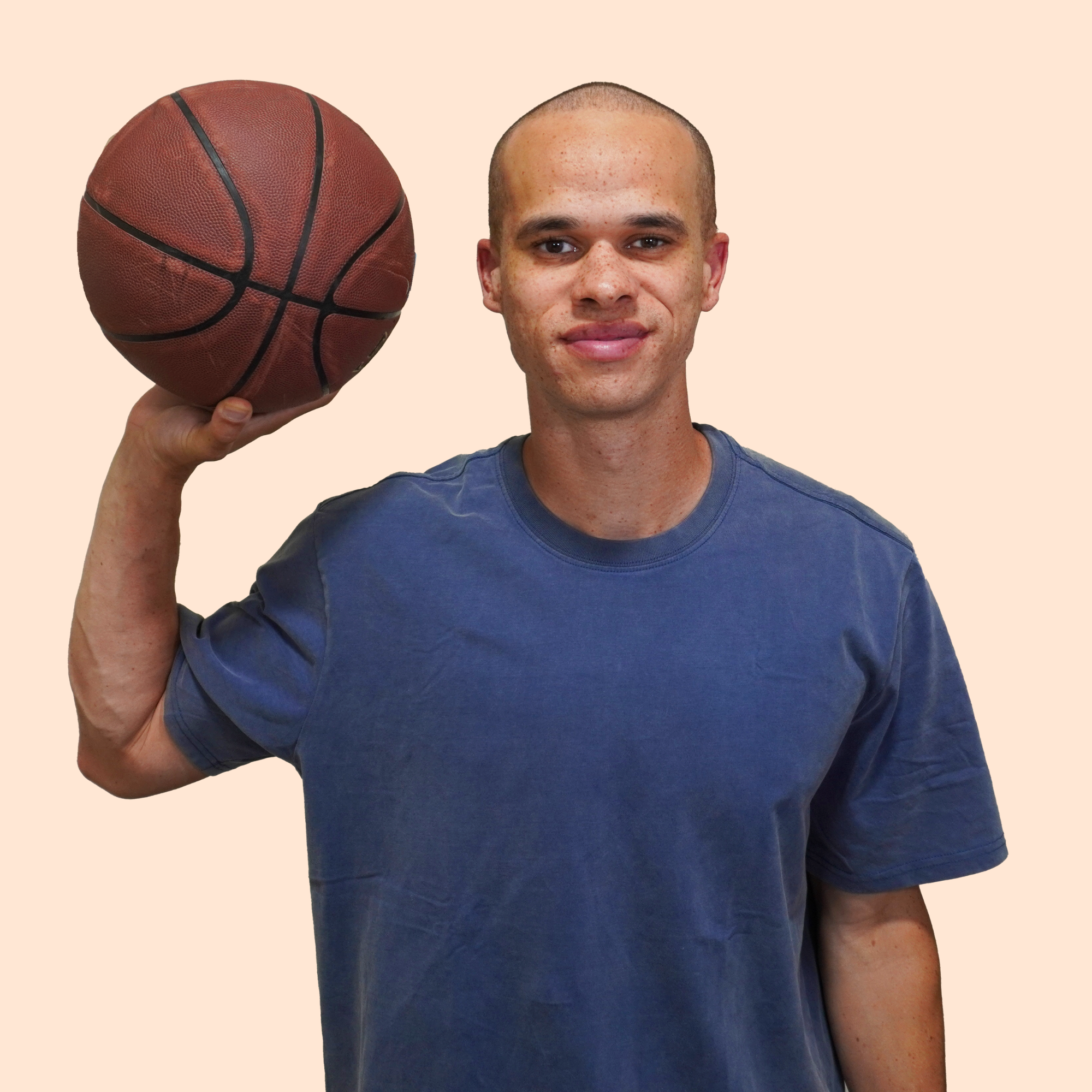 Eric Roberson HOOPTEQ Team Photo holding a basketball