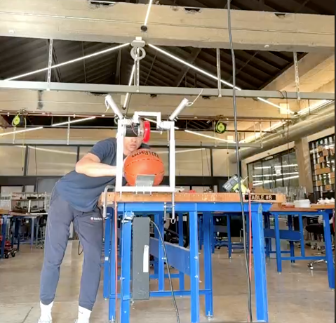 Eric Roberson with an early HOOPTEQ prototype during product development.